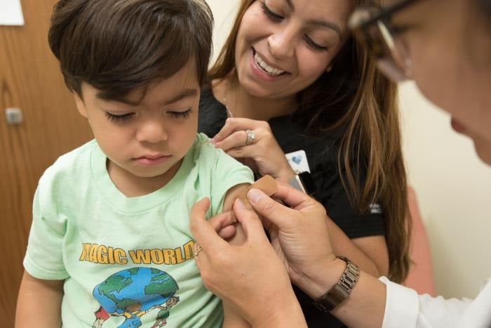 Young child just received a seasonal influenza vaccine